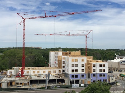 At the jobsite, the cranes lifted panelized wood-framed walls and other materials weighing up to 2.2 tons at heights up to 66 feet to complete the apartment complex’s construction. With an 8.8-ton-capacity, the cranes had more than enough capability to handle the lifts.