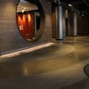 The PolishedCrete team working with Jett Landscape Architecture + Design created a whimsical graphic that resembles a “swirl” effect within the polished concrete surface.