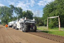 A Wirtgen 240i performs an 8” FDR with oil emulsion.