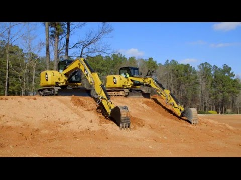 [VDIEO] Cat Compares Variable Angle Booms to Standard Boom on its Mini Excavators