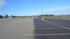 The pavement above is at the Mayo Clinic in Minnesota. The right side of the pavement has received an application of RePLAY while the left has not.