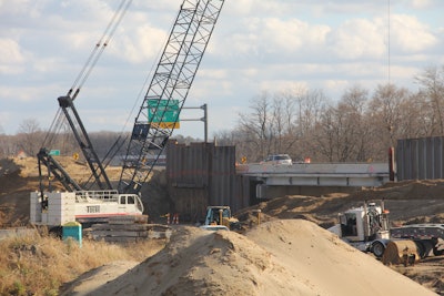 Having three 165-ton class Terex HC 165 lattice boom crawler cranes on the I-96/US-23 project helped Toebe more efficiently handle the mix of concrete beam placements combined with day-to-day lifting needs and their bridge pier pile driving needs.