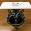 Guzzler pump plate mounted on a pump.