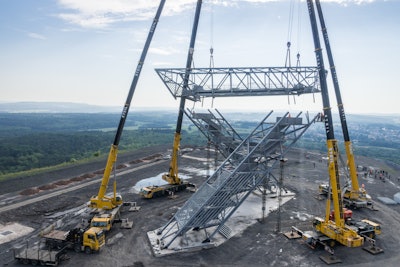 On June 7, 2016, a Terex AC 200 crane and a AC 350 crane owned by Steil lifted the 115-foot-long, 66-ton observation deck for the Saarpolygon together with two other cranes.