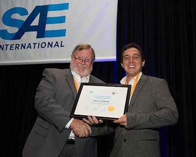 SAE/AEM Outstanding Young Engineer Award 2016 ceremony - Pictured: Award winner Erick Scarpone (R) and Thomas Stover, SAE Commercial Vehicle Sector Vice President (L).