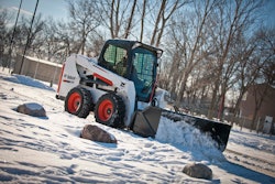 Unlike a pickup truck with a snow blade, a skid-steer loader is not only able to push snow, but lift, pile or load it for transport.
