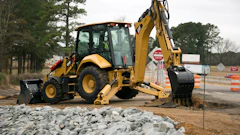 Caterpillar makes pilot controls with pattern changer available even on its entry-level machines. This makes it easier for operators to switch back and forth between excavator and backhoe operation.