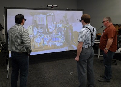 This view of content available in the virtual-reality projection technology that Caterpillar's engineers use to evaluate designs shows the depth of machine detail available. Recent integration of this software with consumer-level HTC Vive virtual-reality goggles proves this content can be used with head-mounted displays. Adaptations to augmented-reality field service tools could dramatically improve supporting field technicians' troubleshooting difficult machine problems.