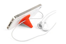 The iCone Stand and Wrap attaches to your phone by suction cup, propping it up for easy watching. The cone then works as a cord wrap to keep cords from tangling.