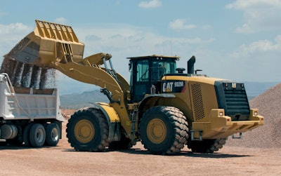 Cat 982M Wheel Loader loading truck with gravel 585c04b5b42d4