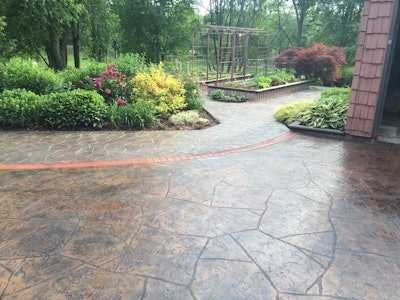 Finished flagstone design illustrates quality achieved using the magnetic seamless pattern stamps.