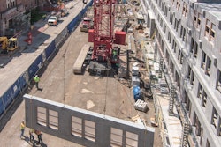 Walbridge convinced the University of Michigan to foresake steel and cast-in-place construction, assembling walls and floor for the $131-million Munger Graduate Residence Hall from more than 1,000 precast panels. Sixty were delivered each day, and panels were picked off the trailer and set directly in place on the building.
