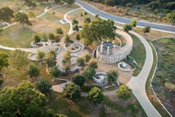 Sundeck of San Antonio, San Antonio, Texas won the WOW! Award, best overall project, for Mission Concepcion Park, also in San Antonio. The surface needed to be durable enough to hold up under significant bike and foot traffic. The acid stain was applied first, followed by months of using a needle scaler to remove the surface of the concrete. The beautiful transformation to stained and exposed concrete pavement presents a wonderful contrast between liquid nature and solid infrastructure.