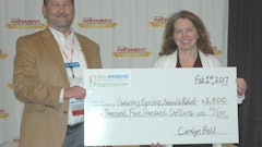 Phillips presented a $2,500 check on behalf of the 1-800-Sweeper foundation to help rebuild Gatlinburg after the fires.