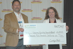Phillips presented a $2,500 check on behalf of the 1-800-Sweeper foundation to help rebuild Gatlinburg after the fires.