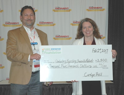 Phillips presented a $2,500 check on behalf of the 1-800-Sweeper foundation to help rebuild Gatlinburg after the fires.