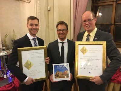 Johan Sjöberg, Joakim Unnebäck and Rikard Mäki from Volvo CE collect the prestigious awards for the HX1 prototype.