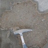 Surface delaminations are separations of the top surface from the underlying concrete.