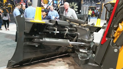 The core feature of the Case DL450 compact dozer loader is a C-Frame dozer interface that pins directly into the chassis of the machine. This provides the stability and smooth operating plane of a compact track loader, and ensures that all operating power and stresses are channeled through the machine’s chassis and not its loader arms.