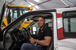 Jose Humberto Avila behind the wheel of the remanufactured Ford Super Duty F-350 pickup truck he won from IronDirect Reman Trucks at CONEXPO-CON/AGG.