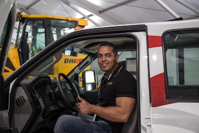 Jose Humberto Avila behind the wheel of the remanufactured Ford Super Duty F-350 pickup truck he won from IronDirect Reman Trucks at CONEXPO-CON/AGG.