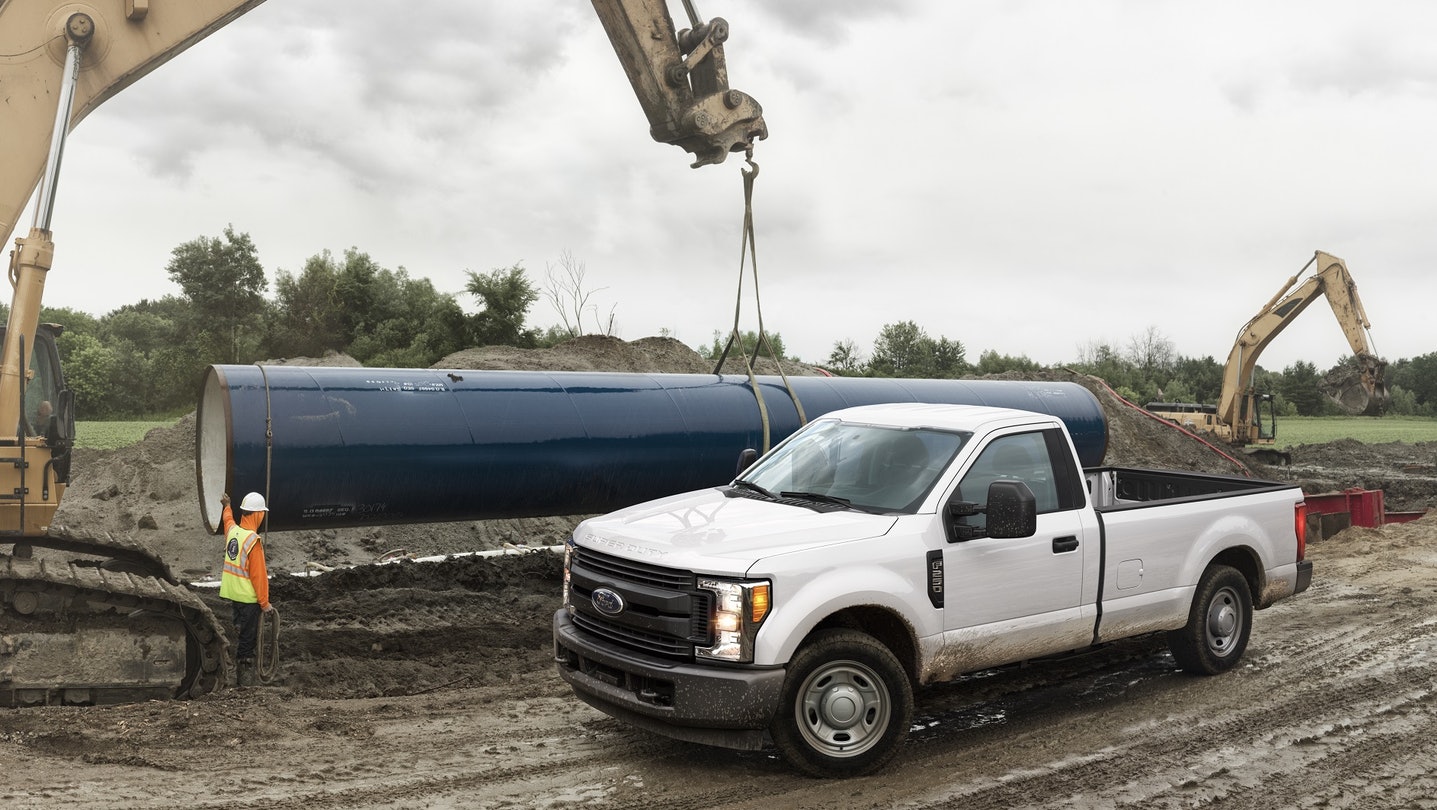 View Pickup Trucks In A Line PNG