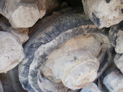 Replace rubber track drive wheels when two-thirds of the rubber is gone. This wheel is still usable.