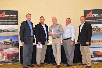 Pictured from left to right: Bull Moose Heavy Haul’s Matt Harper, XL’s Rodney Crim, Pinnacle’s Chuck Guinn, XL's Dennis Wall, XL's Jeff Ingels, as XL presents Pinnacle with its Dealer of the Year award for 2016.