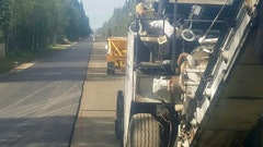 When it came time to pave the 11-ft.-wide road with 4-ft. shoulders on each side Exclusive Paving paved one lane in one direction from start to finish, then turned around and paved the same distance in the other direction, completing the paving with only one seam down the middle.