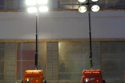 Light emitted by LED (left) is whiter and more like daylight than that given off by a metal halide (right) light tower.