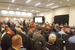 Contractors look to find a seat before the start of one of NPE 2017's standing room-only educational sessions.