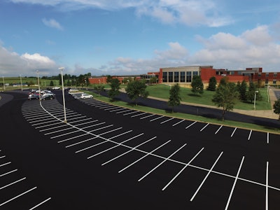The 16-year-old, 10,100 sq.yd. parking lot was in desperate need of reconstruction with visible cracking throughout the area. The company was also challenged with bringing the lot up to 2017 Americans with Disabilities Act (ADA) standards.