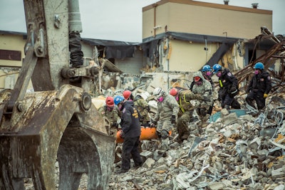 Part of the disaster response training coordinated the “treatment” of the injured onsite.