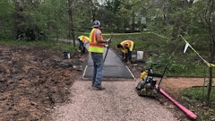 Water passes through the pervious surface of Porous Pave at a rate of 5,800 - 6,300 gallons per hour per square foot, allowing stormwater to percolate down through the base below. This also means that before installation, an open-graded stone is put down to help add water storage and protect the base from deterioration.