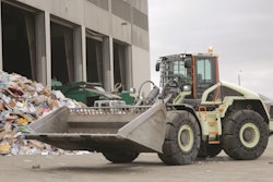 Volvo CE's LX1 prototype electric hybrid wheel loader at Waste Management's Moreno Valley Transfer Station. The LX1 is a series hybrid, which puts an electric motor at each wheel and replaces an equivalent-sized conventional loader's 13L engine with a 3.6L diesel, on board strictly to run the loader's generator. Volvo says 98% of the components on the LX1 are new.