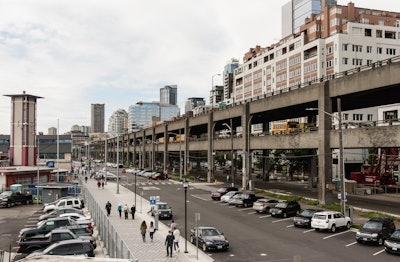 Demolition of the remaining portion of the Alaskan Way Viaduct will be challenging as the remaining roadway is right next to buildings and the new roadway below it.