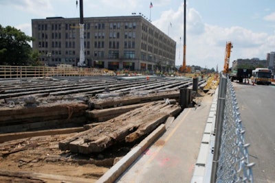 Work crews work to replace a bridge over the Massachusetts Turnpike, part of in MassDOT's (Massachusetts Department of Transportation) Commonwealth Avenue Bridge Replacement Project, in Boston, Massachusetts, U.S., August 4, 2017.