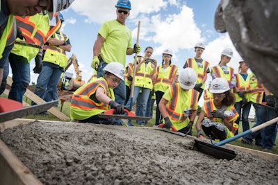 At Miron's 2017 Build Like a Girl event, participants experienced different stations of a jobsite including pouring and finishing a concrete slab.
