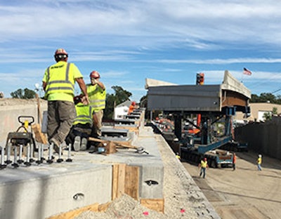 The general contractor assembled the bridge with precast foundation elements and constructed the new bridge decks on large supports in temporary staging areas, adjacent to the current bridges.