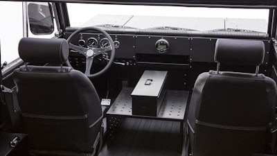 Battery and drivetrain installed in the chassis leaves a clean, nearly flat floor with 49-in. cargo width to accommodate 4x8 sheeting.