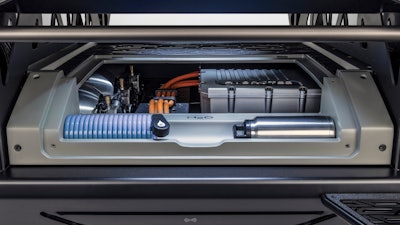 Water hose and bottle in the Silent Utility Rover Universal Superstructure compartment demonstrate potential uses of water vapor from the hydrogen fuel cell's exhaust.
