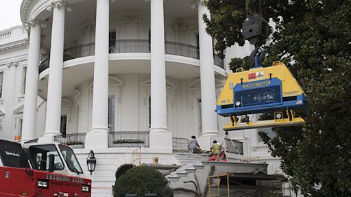 A Vacuworx MC 5 with custom pad assembly is shown in front of White House South Portico steps.