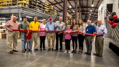 The Ribbon Cutting Ceremony for the new Distribution Center for Allen Engineering Corporation. From Left to Right: Denny Ahal, John Allen Jr., Jaxson Allen, John Allen, Mary Ann Allen, Dewayne Allen, Jay Allen, Lesle Allen, Mary Leigh Allen, Anna Joy Allen, Grace Allen, Roger Euliss, Lindley Smith.
