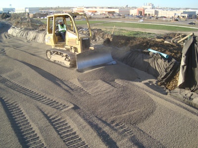 Once the fill materials were in place, they were covered with a crushed limestone base subgrade, hot mix asphalt and topped with a 10-in. concrete paved road.