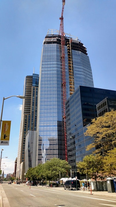 Construction workers topped out and completed exterior glazing, making 1144 Fifteenth a prominent addition to the Denver skyline.