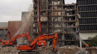 Colorado Cleanup Corporation employed both traditional hose dust suppression methods and modern atomized dust suppression during demolition.