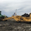 Earth Max started out with a used K-Tec scraper and later purchased two new K-Tec 1233 scrapers, each of which holds a 33-cu.-yd. heaped capacity.