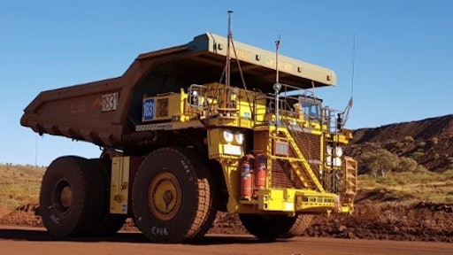 A standard truck 830E with the AHS retrofit kit running in autonomous mode at Rio Tinto’s mine in Australia.