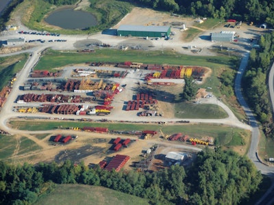 Outside storage for equipment such as crane-boom sections requires the use of treated lumber or other material to keep the equipment off the ground.