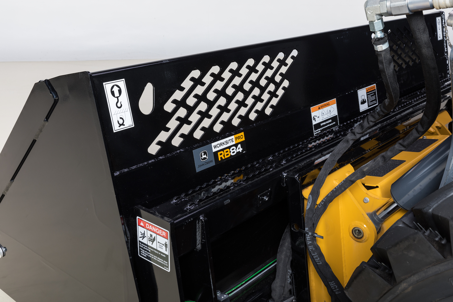 John Deere Rollout Buckets Extend Dump Reach on Compact Track & Wheel